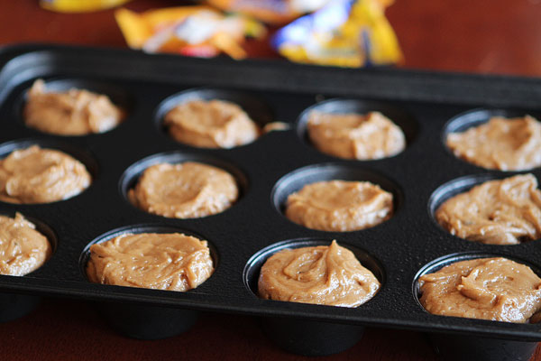 Frosted Candy Bar Stuffed Cookie Cups Frosted Candy Bar Stuffed Cookie Cups