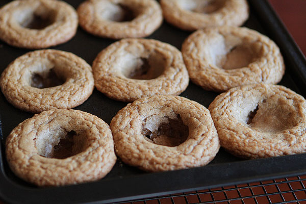 Frosted Candy Bar Stuffed Cookie Cups Frosted Candy Bar Stuffed Cookie Cups