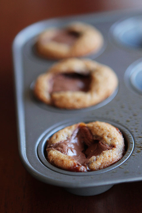 Frosted Candy Bar Stuffed Cookie Cups Frosted Candy Bar Stuffed Cookie Cups