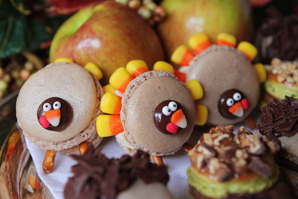 Thanksgiving Themed Holiday Macarons: Caramel Apple Macarons, Chocolate Acorns, and Chocolate Peanut Butter Candy Corn Turkeys Thanksgiving Themed Holiday Macarons: Caramel Apple Macarons, Chocolate Acorns, and Chocolate Peanut Butter Candy Corn Turkeys