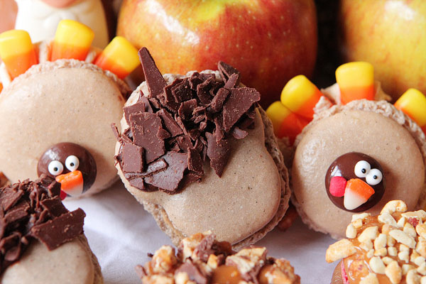 Thanksgiving Themed Holiday Macarons: Caramel Apple Macarons, Chocolate Acorns, and Chocolate Peanut Butter Candy Corn Turkeys Thanksgiving Themed Holiday Macarons: Caramel Apple Macarons, Chocolate Acorns, and Chocolate Peanut Butter Candy Corn Turkeys