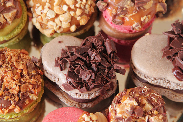 Thanksgiving Themed Holiday Macarons: Caramel Apple Macarons, Chocolate Acorns, and Chocolate Peanut Butter Candy Corn Turkeys Thanksgiving Themed Holiday Macarons: Caramel Apple Macarons, Chocolate Acorns, and Chocolate Peanut Butter Candy Corn Turkeys
