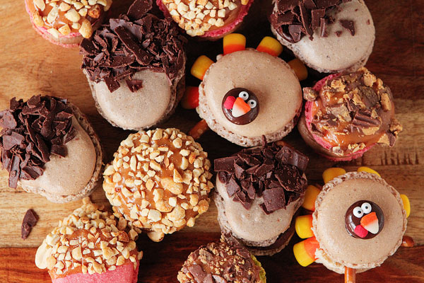 Thanksgiving Themed Holiday Macarons: Caramel Apple Macarons, Chocolate Acorns, and Chocolate Peanut Butter Candy Corn Turkeys Thanksgiving Themed Holiday Macarons: Caramel Apple Macarons, Chocolate Acorns, and Chocolate Peanut Butter Candy Corn Turkeys