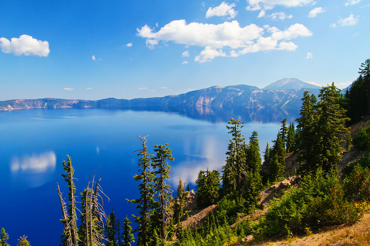 { PHOTOS } Crater Lake, Oregon: Home of the remarkably blue, crystal clear waters of the nation's deepest lake. www.kevinandamanda.com #travel { PHOTOS } Crater Lake, Oregon: Home of the remarkably blue, crystal clear waters of the nation's deepest lake. www.kevinandamanda.com #travel