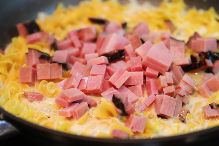 Peas, Ham, and Creamy Noodles -- A perfect, easy one dish skillet dinner, made in less than 15 mins! You even boil the noodles right in the skillet. www.kevinandamanda.com Peas, Ham, and Creamy Noodles -- A perfect, easy one dish skillet dinner, made in less than 15 mins! You even boil the noodles right in the skillet. www.kevinandamanda.com