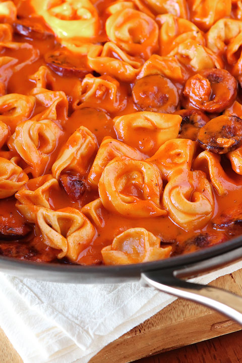 Cheesy Sausage Tortellini Recipe. SO GOOD! One dish, and done in 30 mins or less. www.kevinandamanda.com Cheese and Sausage Tortellini Pasta Recipe