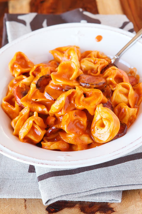 Cheesy Sausage Tortellini Recipe. SO GOOD! One dish, and done in 30 mins or less. www.kevinandamanda.com Cheese and Sausage Tortellini Pasta Recipe