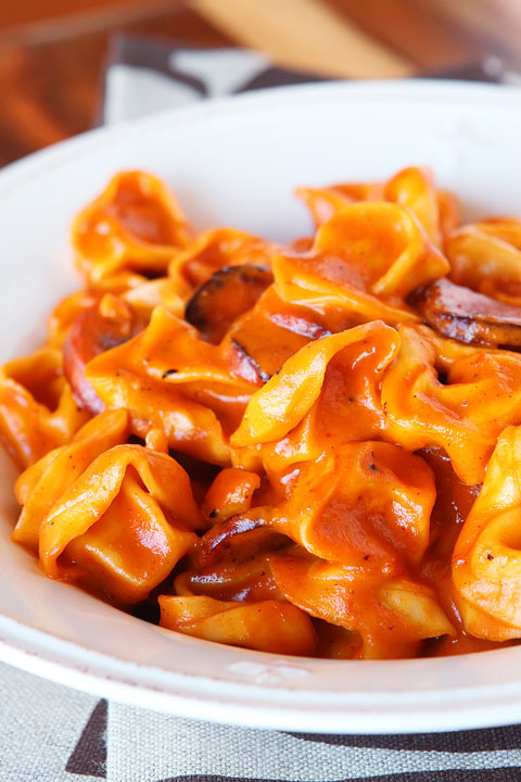 Cheesy Sausage Tortellini Recipe. SO GOOD! One dish, and done in 30 mins or less. www.kevinandamanda.com Cheese and Sausage Tortellini Pasta Recipe