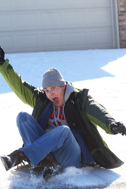 Kevin on His Sled Image of Kevin Sledding