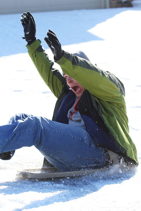 Kevin Almost Falling off His Sled Image of Kevin Almost Falling off His Sled