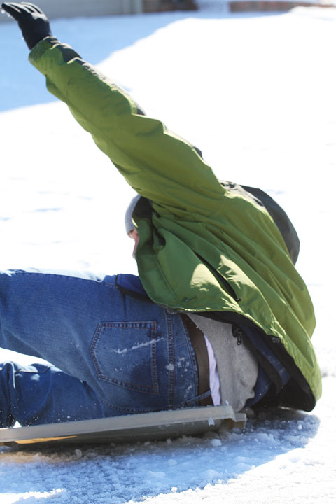 Kevin Wiping Out on His Sled Image of Kevin Wiping Out
