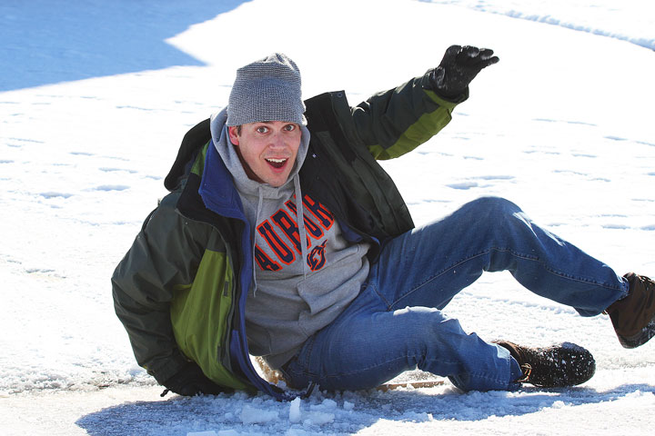 Kevin on his Sled Image of Kevin Having Fun on His Sled