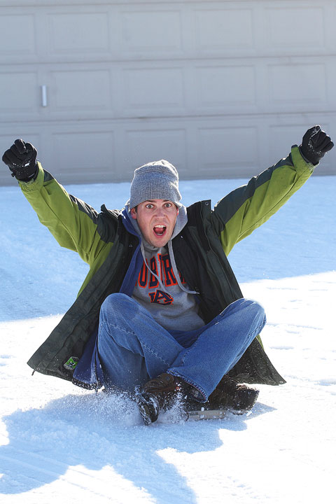 Kevin on His Sled Image of Kevin During a Sledding Run