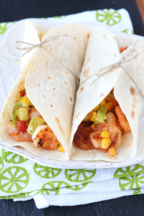 Love these Firecracker Shrimp Tacos with Avocado Corn Salsa. Fresh, spicy, and bursting with flavor!