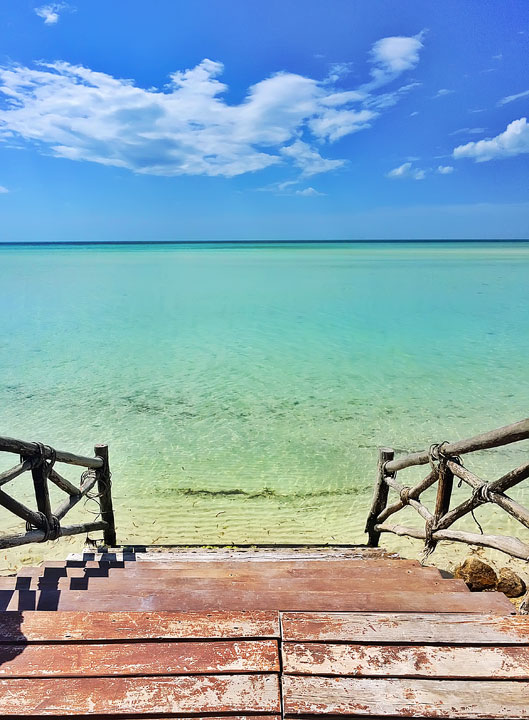 Incredible travel photos from the enchanted island of Isla Holbox off the coast of Cancun, Mexico. You must see this island once before you die. #travel #cancun #mexico