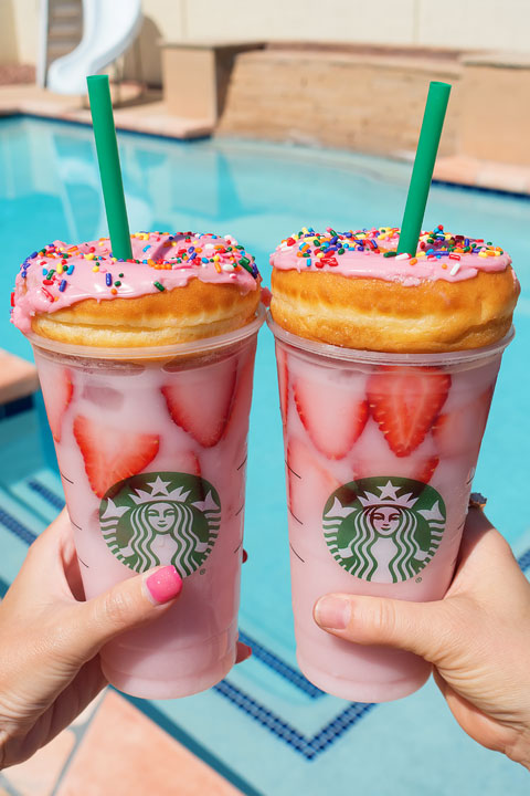 Pink Drinks and Doughnuts by the Pool Image of Pink Drinks and Doughnuts by the Pool
